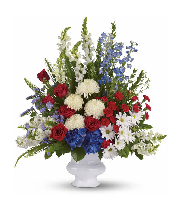 Floral arrangement with red, white, and blue flowers, WithDistinction.